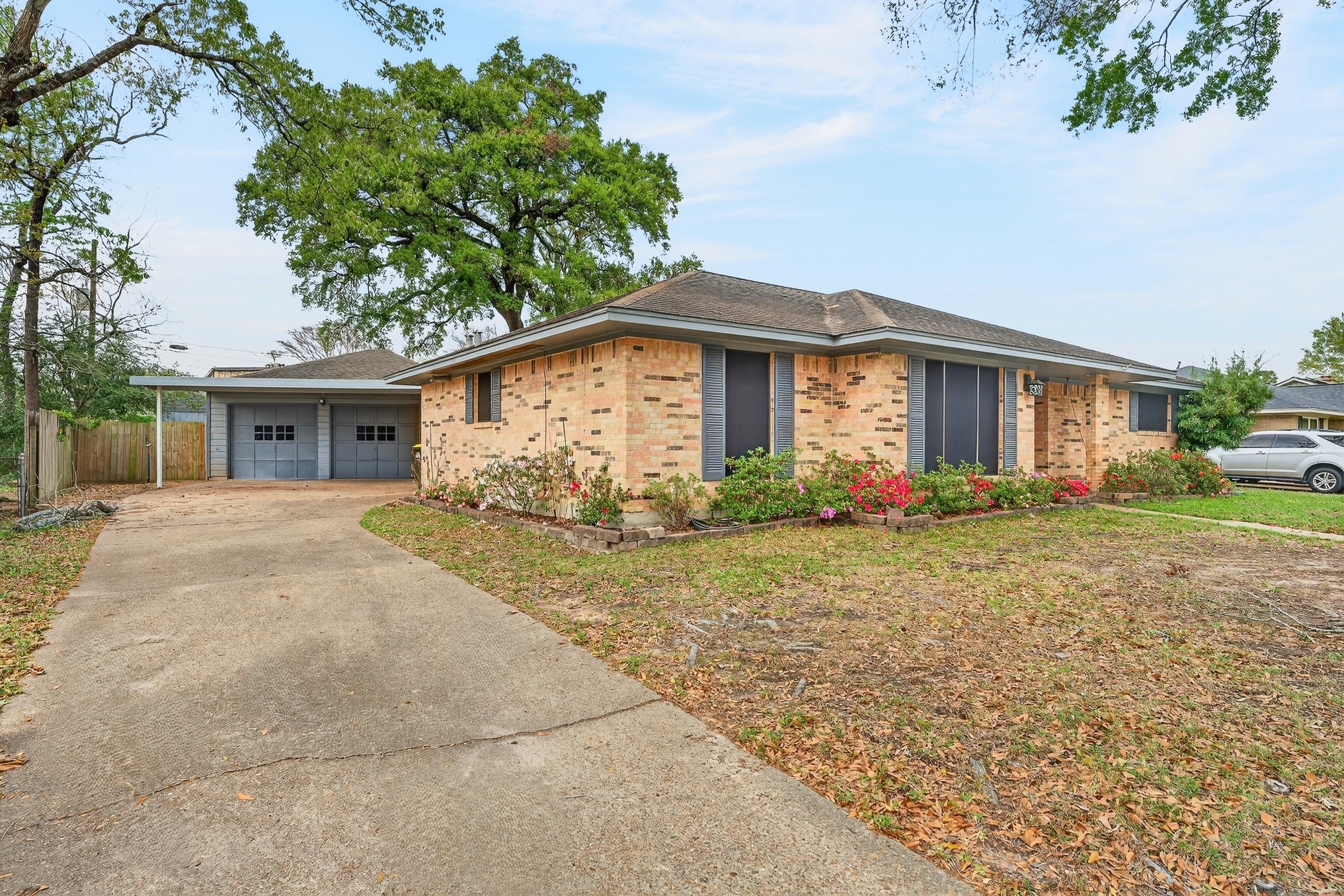 304 Fullen Street Conroe, TX 77301 - Photo 2 of 25 Has charming curb appeal and all sides brick up to the eaves.