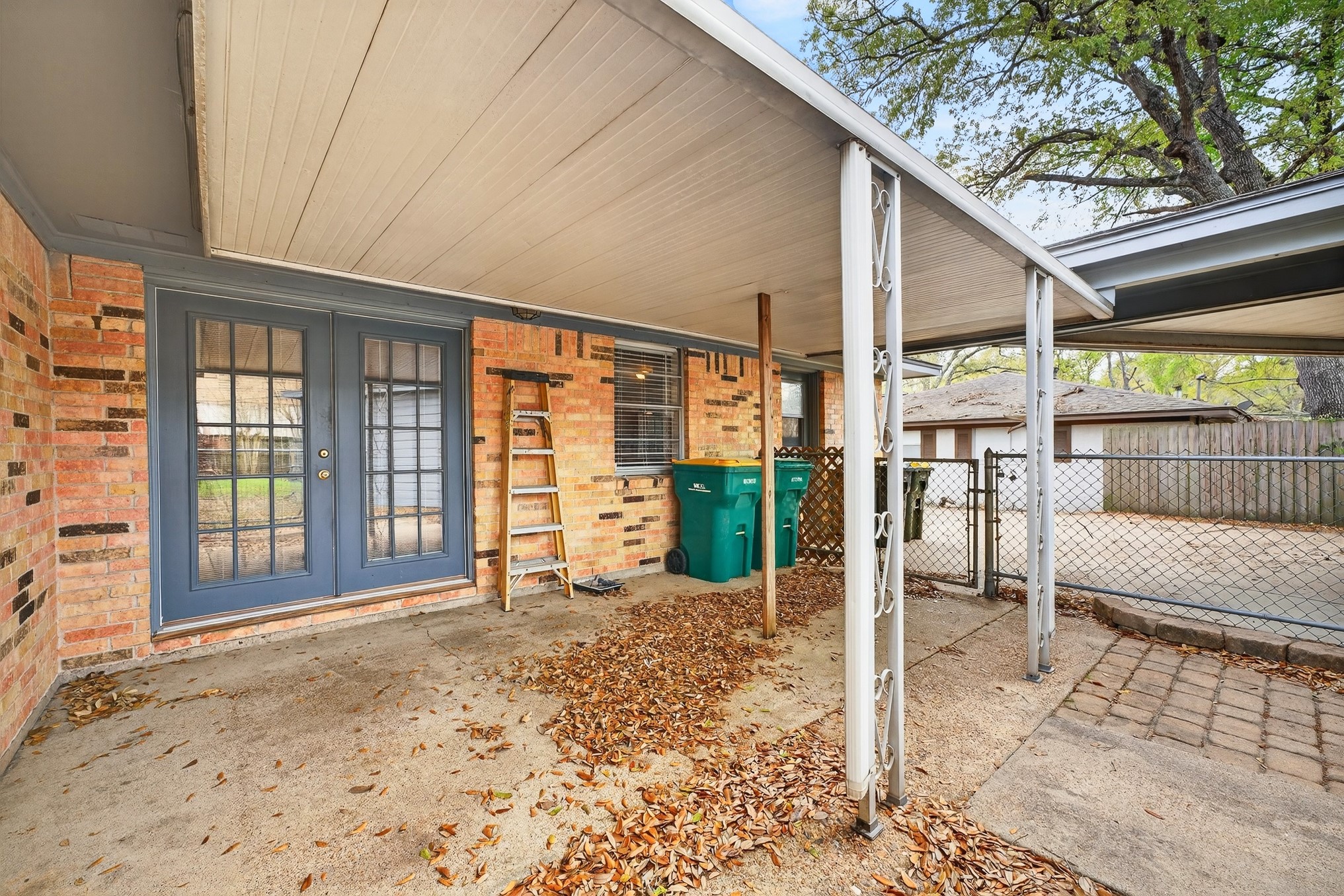 304 Fullen Street Conroe, TX 77301 - Photo 24 of 25 Living space continues to the covered backyard patio.
