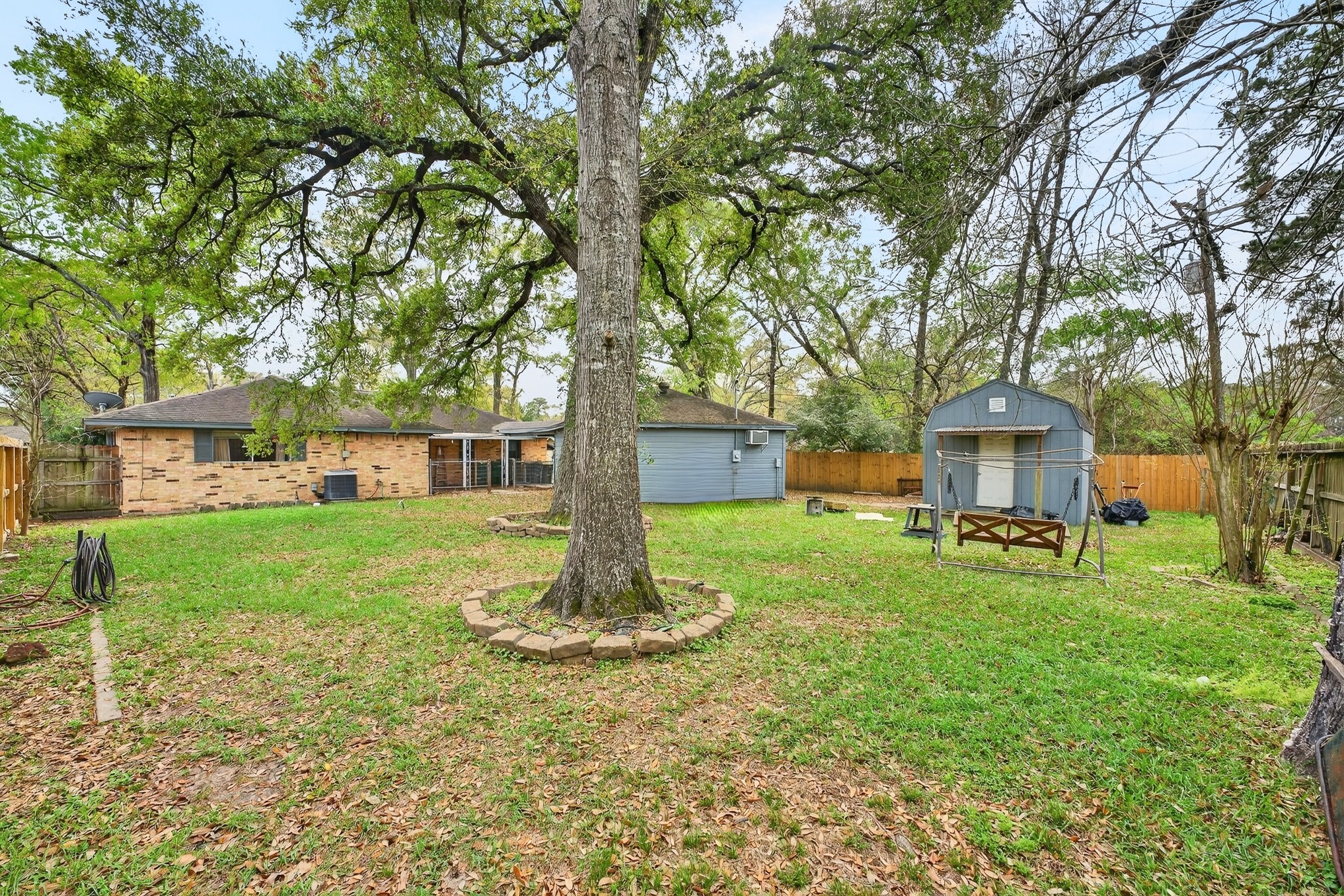 304 Fullen Street Conroe, TX 77301 - Photo 25 of 25 11,199 sq ft lot with beautiful mature trees!
