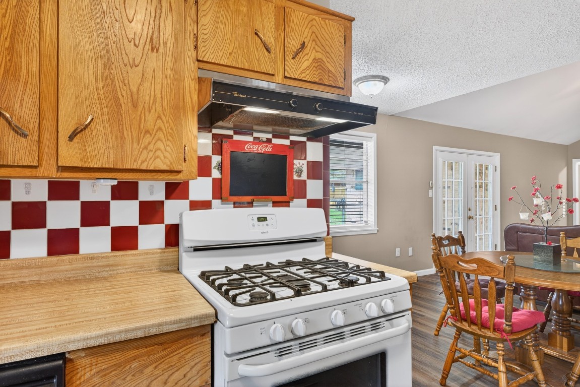 304 Fullen Street Conroe, TX 77301 - Photo 8 of 25 You're cooking with gas here! Also noticing how great Coca-Cola decor fits in!