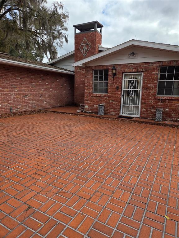 4911 West Sam Allen Road Plant City, FL 33565 - Photo 5 of 11 an outdoor view of house with blue space