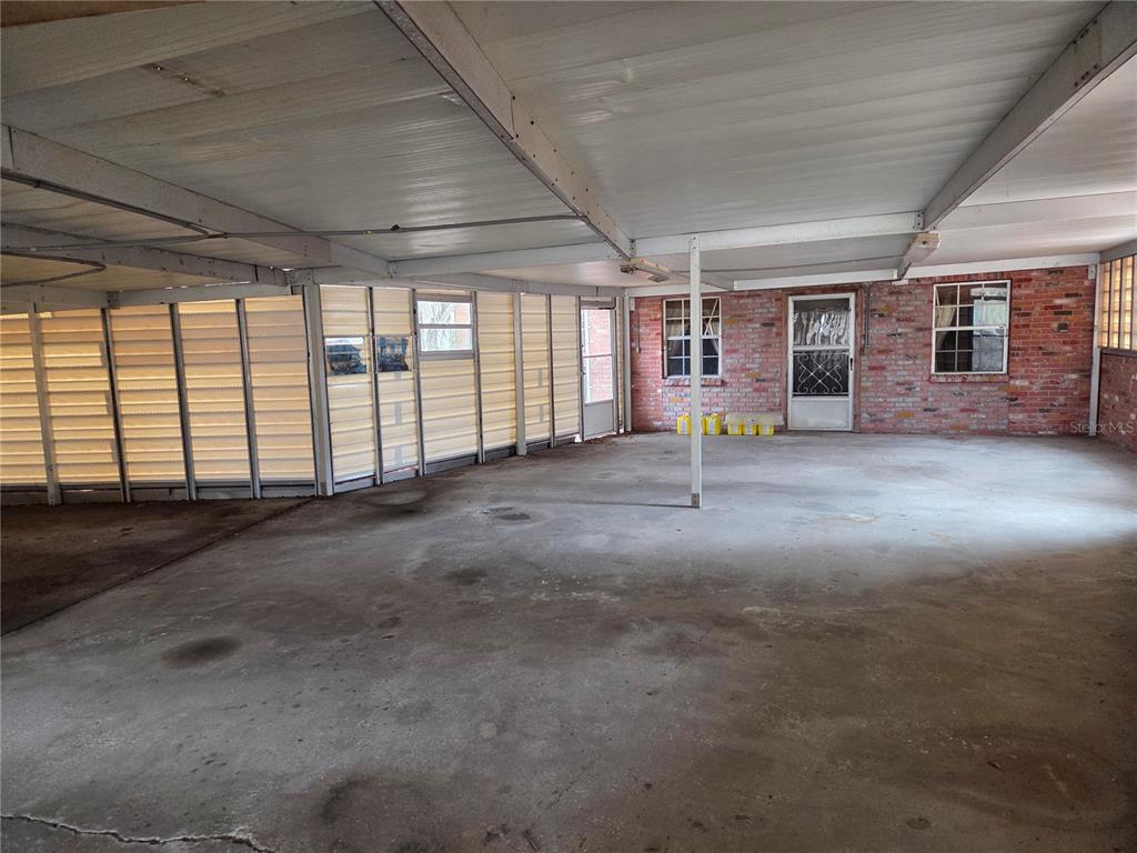 4911 West Sam Allen Road Plant City, FL 33565 - Photo 6 of 11 a view of a room with gym equipment