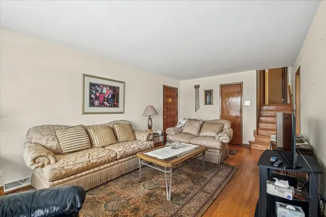 a living room with furniture or couch and a flat screen tv