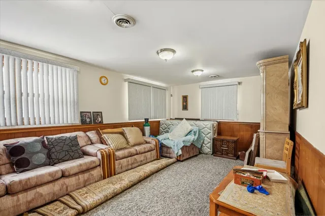 a living room with furniture and a couch