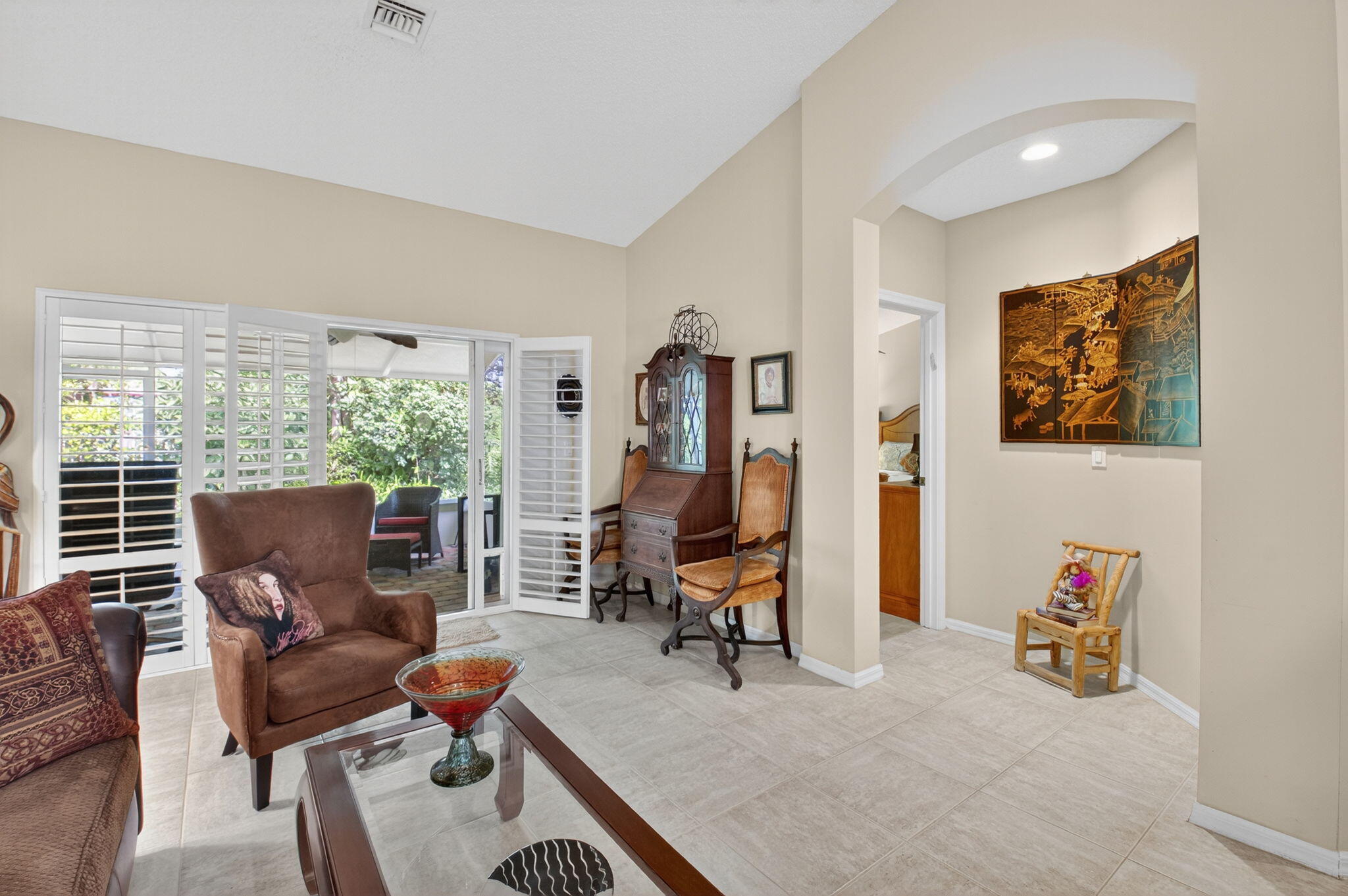 6129 Petunia Road Delray Beach, FL 33484 - Photo 20 of 73 a living room with furniture and a large window