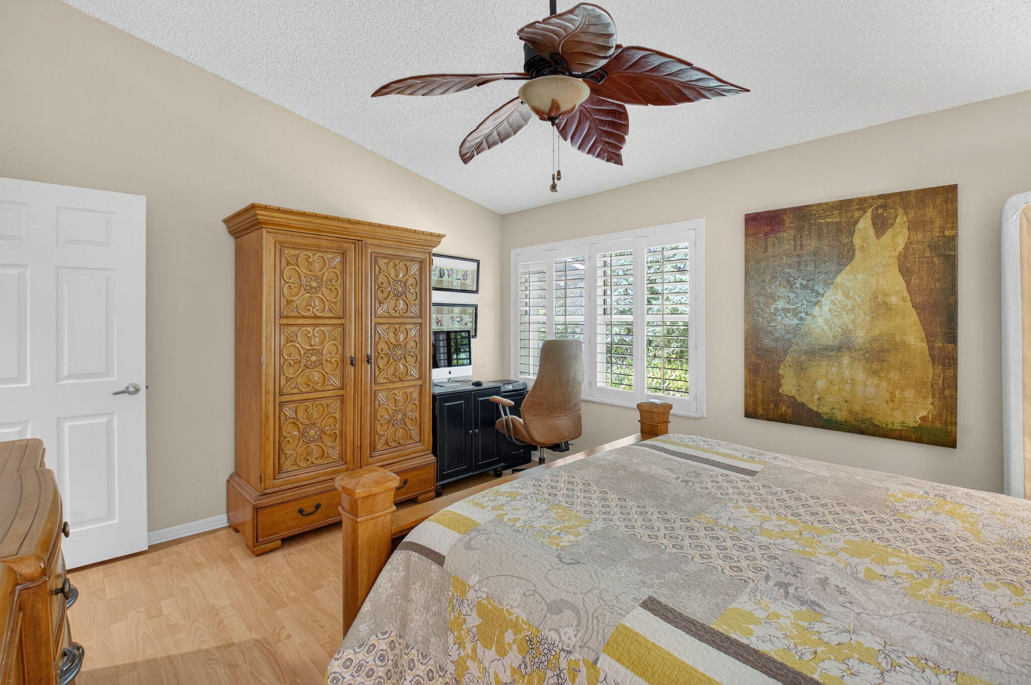 6129 Petunia Road Delray Beach, FL 33484 - Photo 22 of 73 a bed room with a bed and a painting on the wall