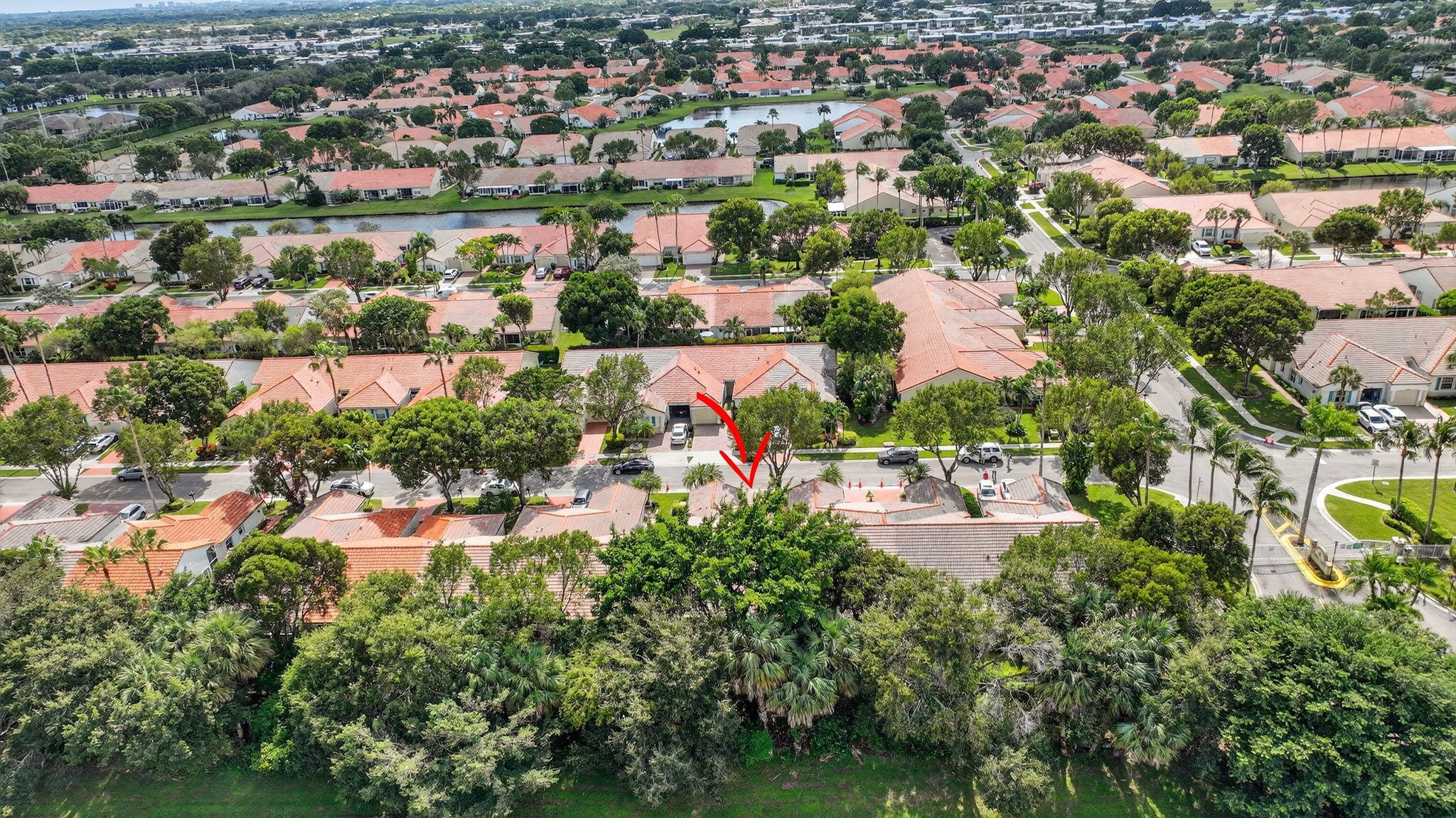 6129 Petunia Road Delray Beach, FL 33484 - Photo 37 of 73 an aerial view of residential houses with outdoor space and trees