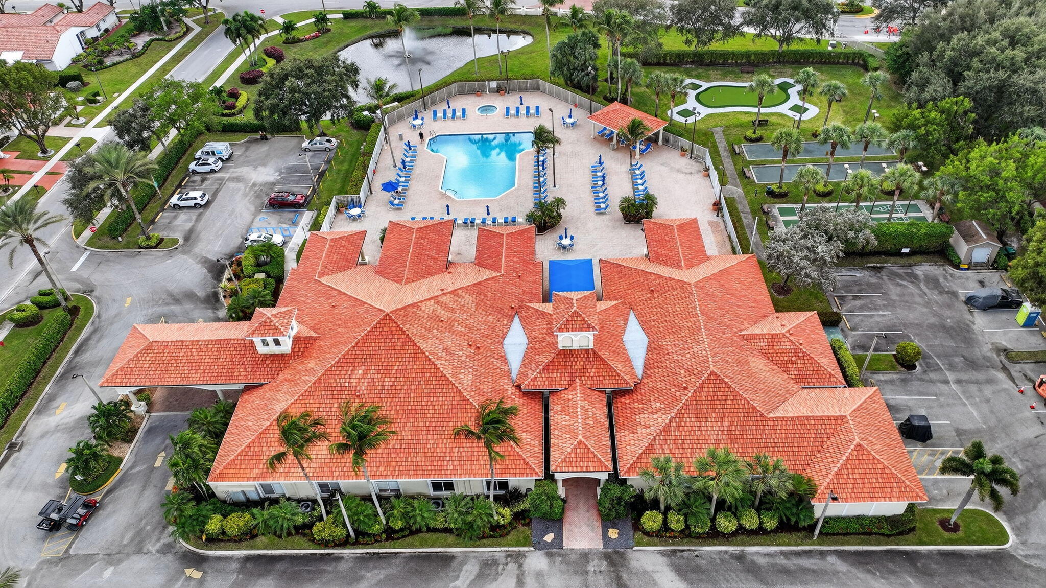 6129 Petunia Road Delray Beach, FL 33484 - Photo 40 of 73 an aerial view of residential houses with outdoor space and swimming pool