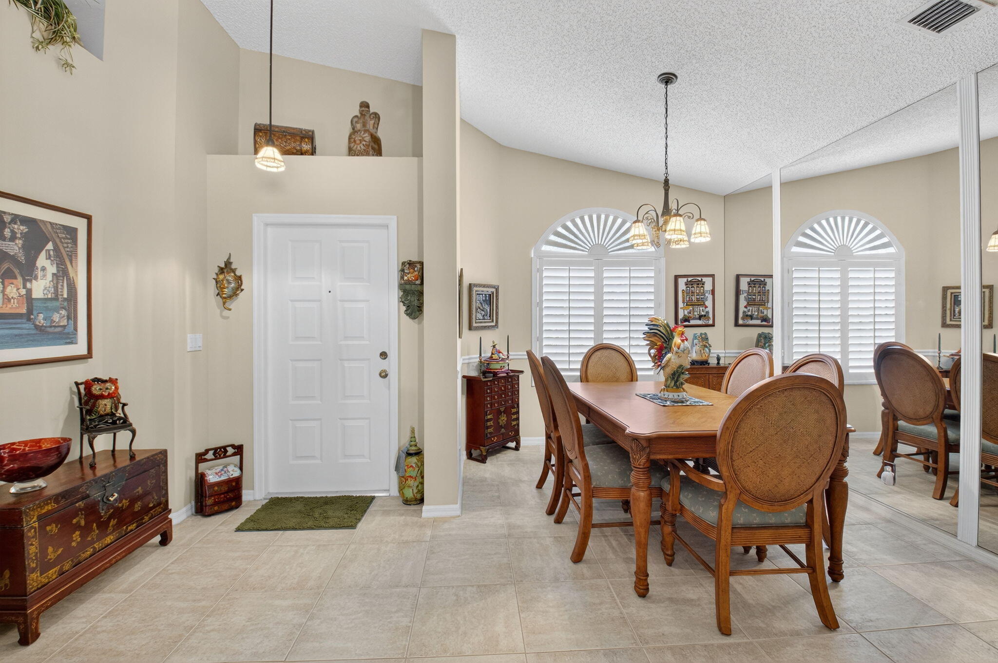 6129 Petunia Road Delray Beach, FL 33484 - Photo 9 of 73 a view of a dining room with furniture window and outside view
