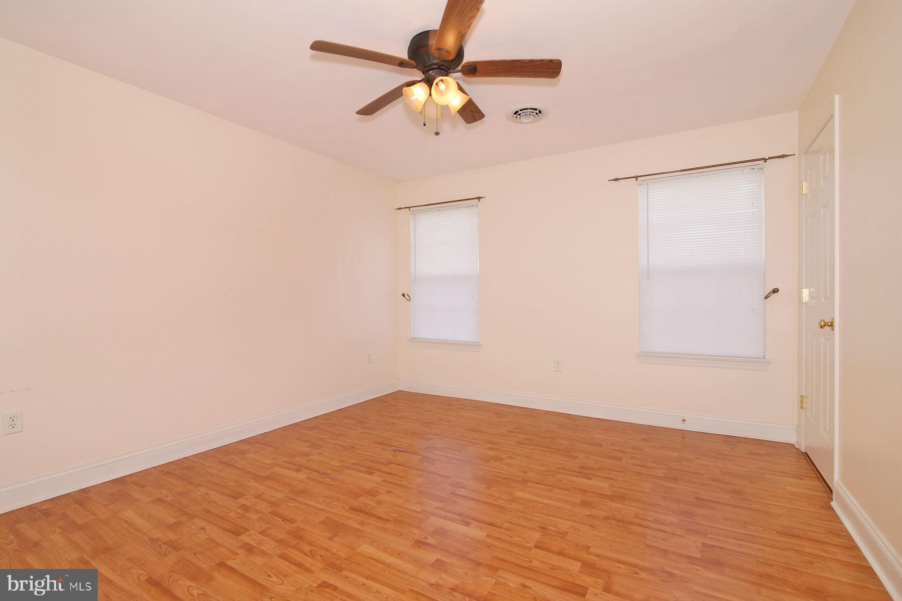 43 Farm Lane Lancaster, PA 17603 - Photo 27 of 42 an empty room with a window and a fan