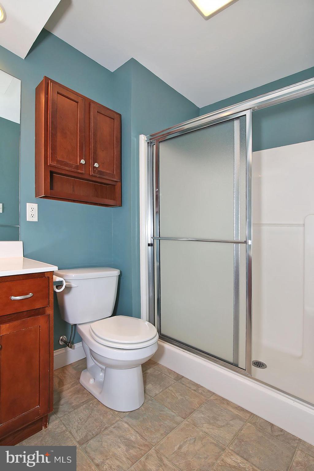 43 Farm Lane Lancaster, PA 17603 - Photo 30 of 42 a bathroom with a toilet and a shower