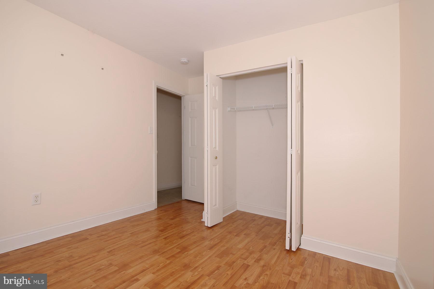 43 Farm Lane Lancaster, PA 17603 - Photo 36 of 42 an empty room with wooden floor and closet