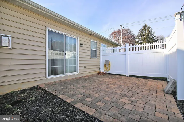 a view of a house with a gate