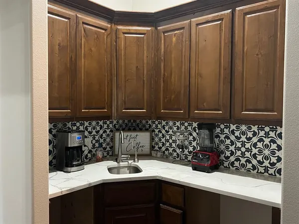 a room with furniture and gym equipment