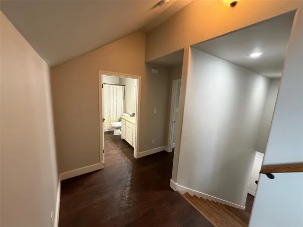a bathroom with a sink a mirror and a bathtub