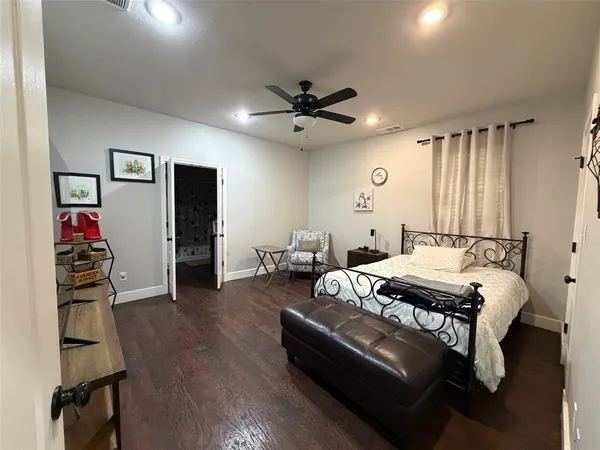 a bathroom with a sink a mirror and a toilet