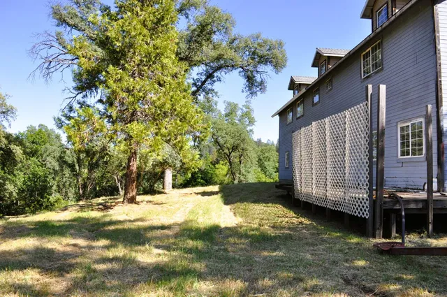 a view of swimming pool with a backyard