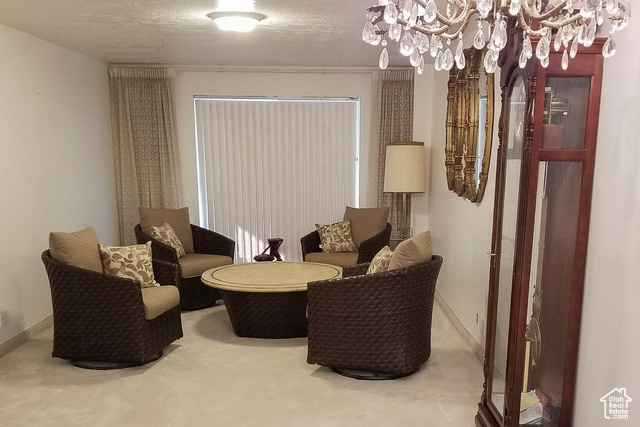 2855 South 1000 West Perry, UT 84302 - Photo 18 of 142 Living area with a textured ceiling and baseboards