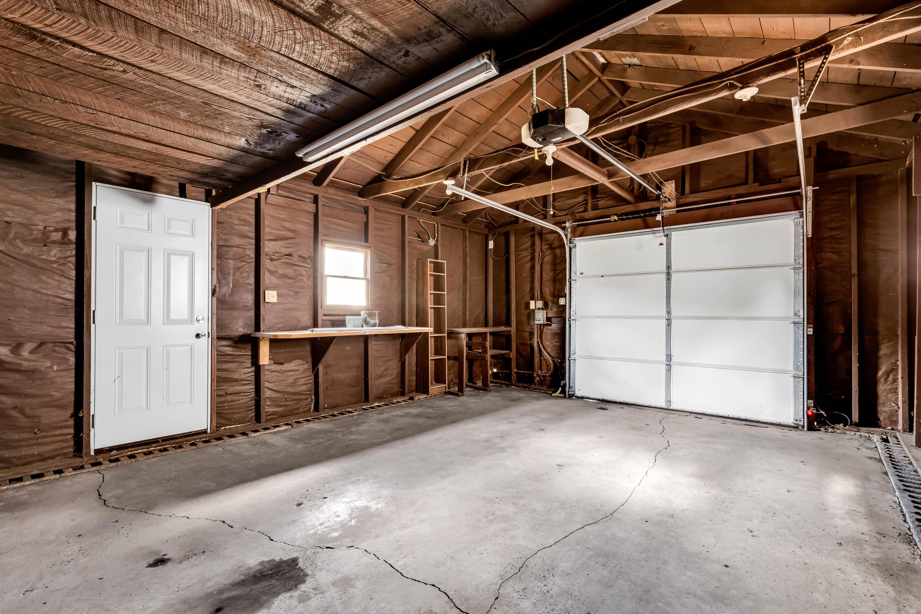 2033 Zollinger Road Columbus, OH 43221 - Photo 34 of 44 • 1.5+ car detached
• Concrete floor
• Wood exterior
• Loft area for storage
• Genie® electric door
opener
• Service door