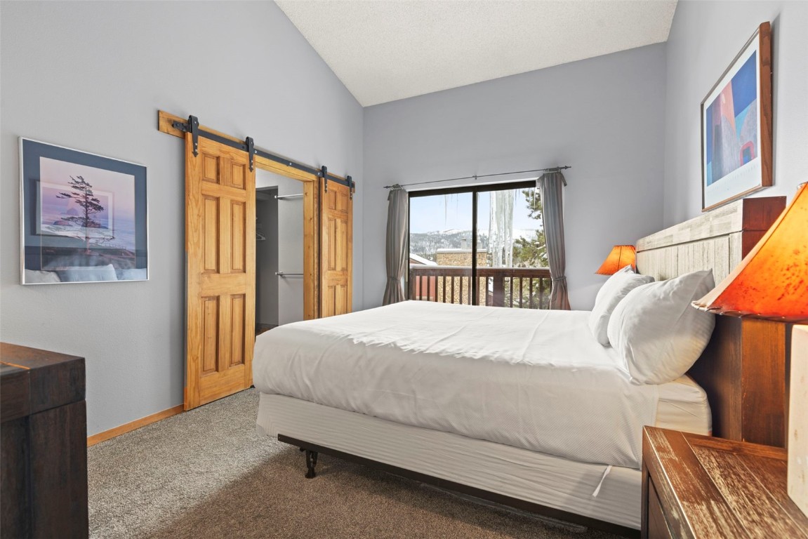 405 4 O Clock Road, Unit 12F Breckenridge, CO 80424 - Photo 20 of 43 Primary bedroom with private balcony