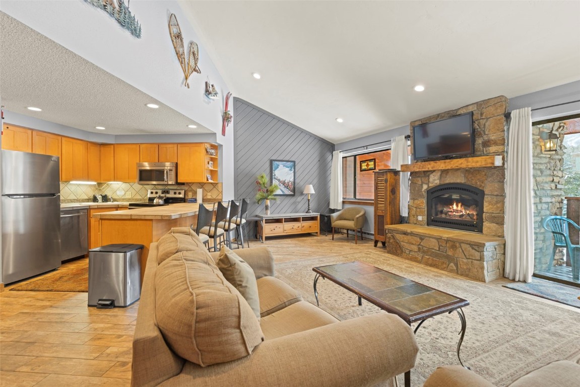 View of the large living room with vaulted ceilings