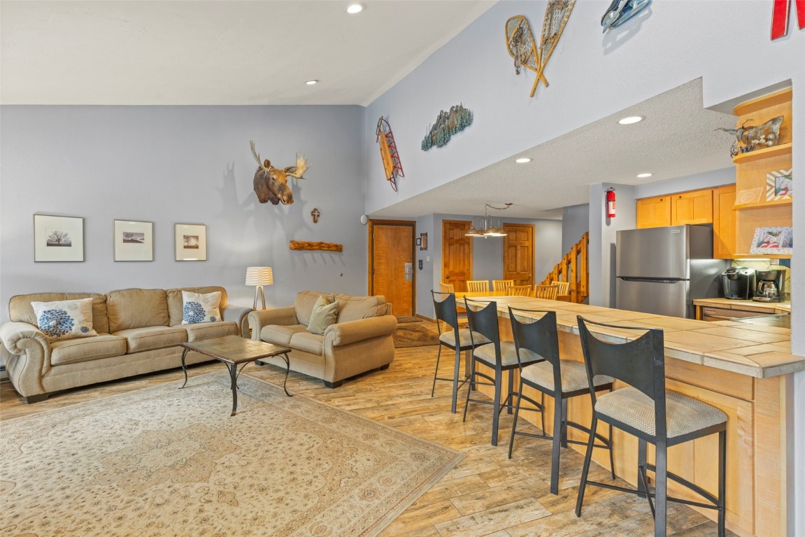 405 4 O Clock Road, Unit 12F Breckenridge, CO 80424 - Photo 9 of 43 View of living room with ample natural light
