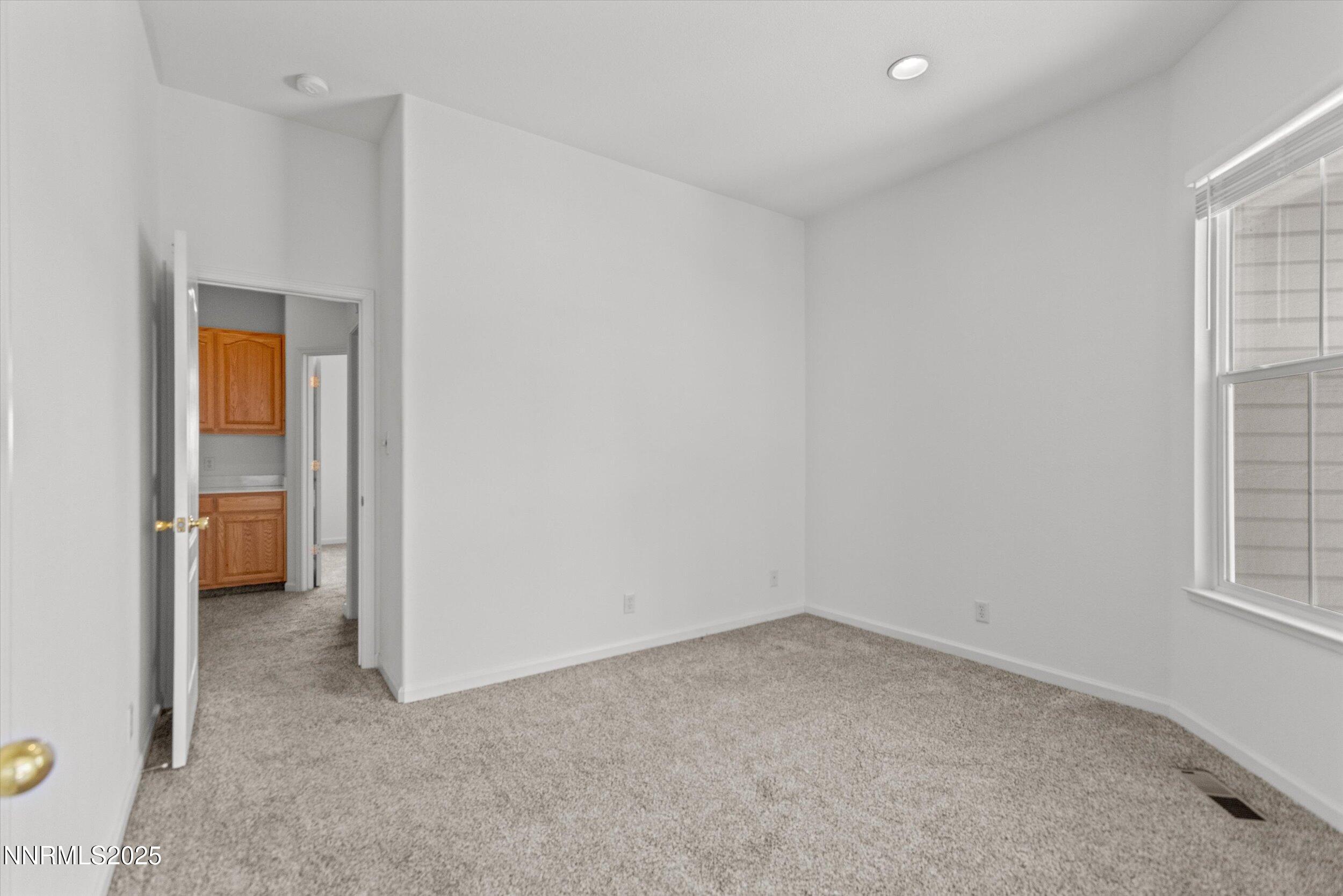 2365 Red Maple Court Reno, NV 89523 - Photo 21 of 34 an empty room with windows and closet