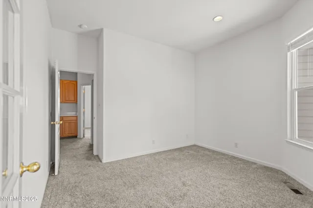 an empty room with window