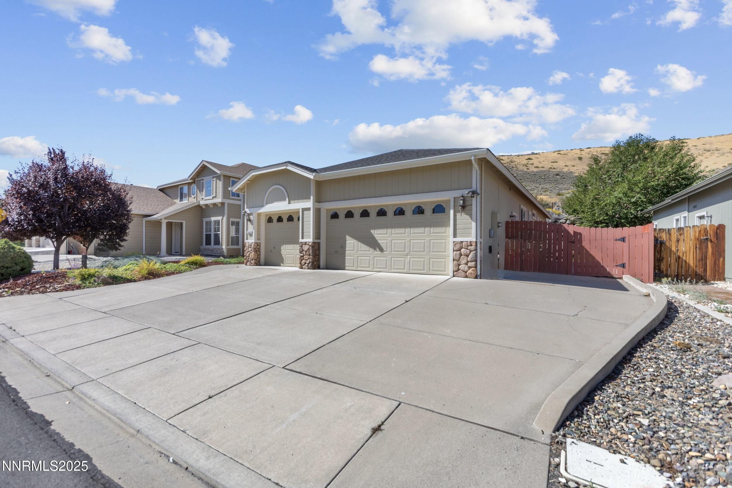 2365 Red Maple Court Reno, NV 89523 - Photo 3 of 34 a front view of a house with a yard