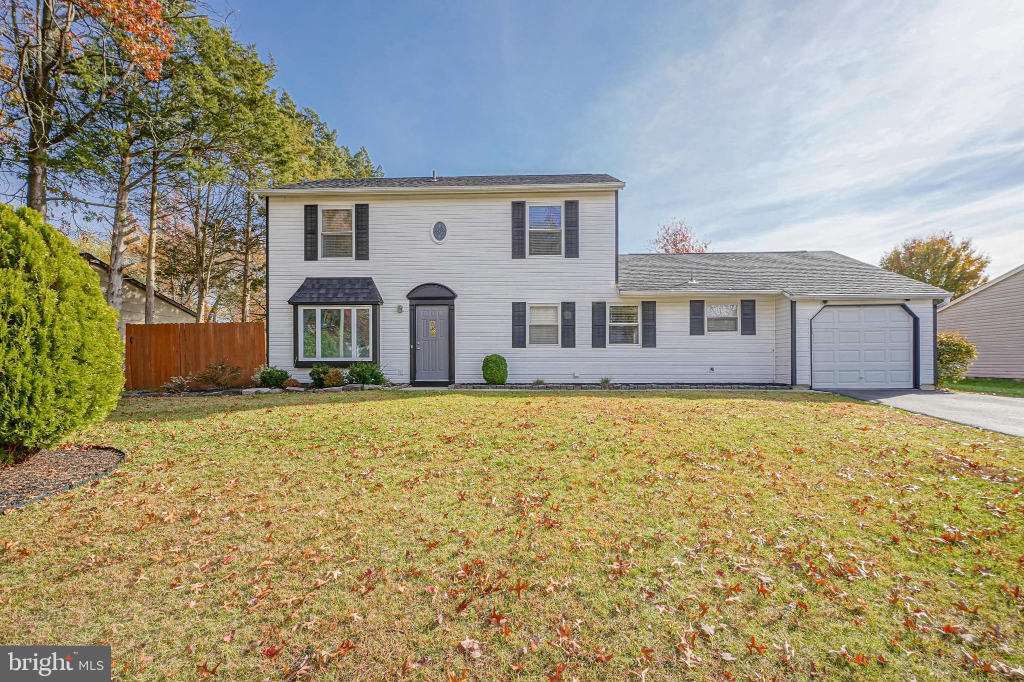 10 Gladstone Road Marlton, NJ 08053 - Photo 1 of 28 a front view of a house with a yard
