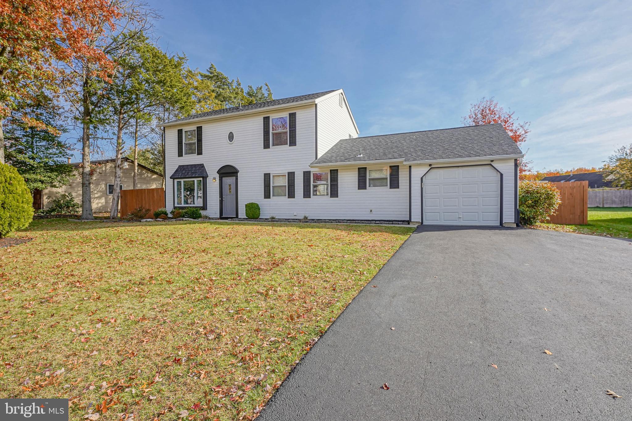 10 Gladstone Road Marlton, NJ 08053 - Photo 2 of 28 a front view of a house with a yard