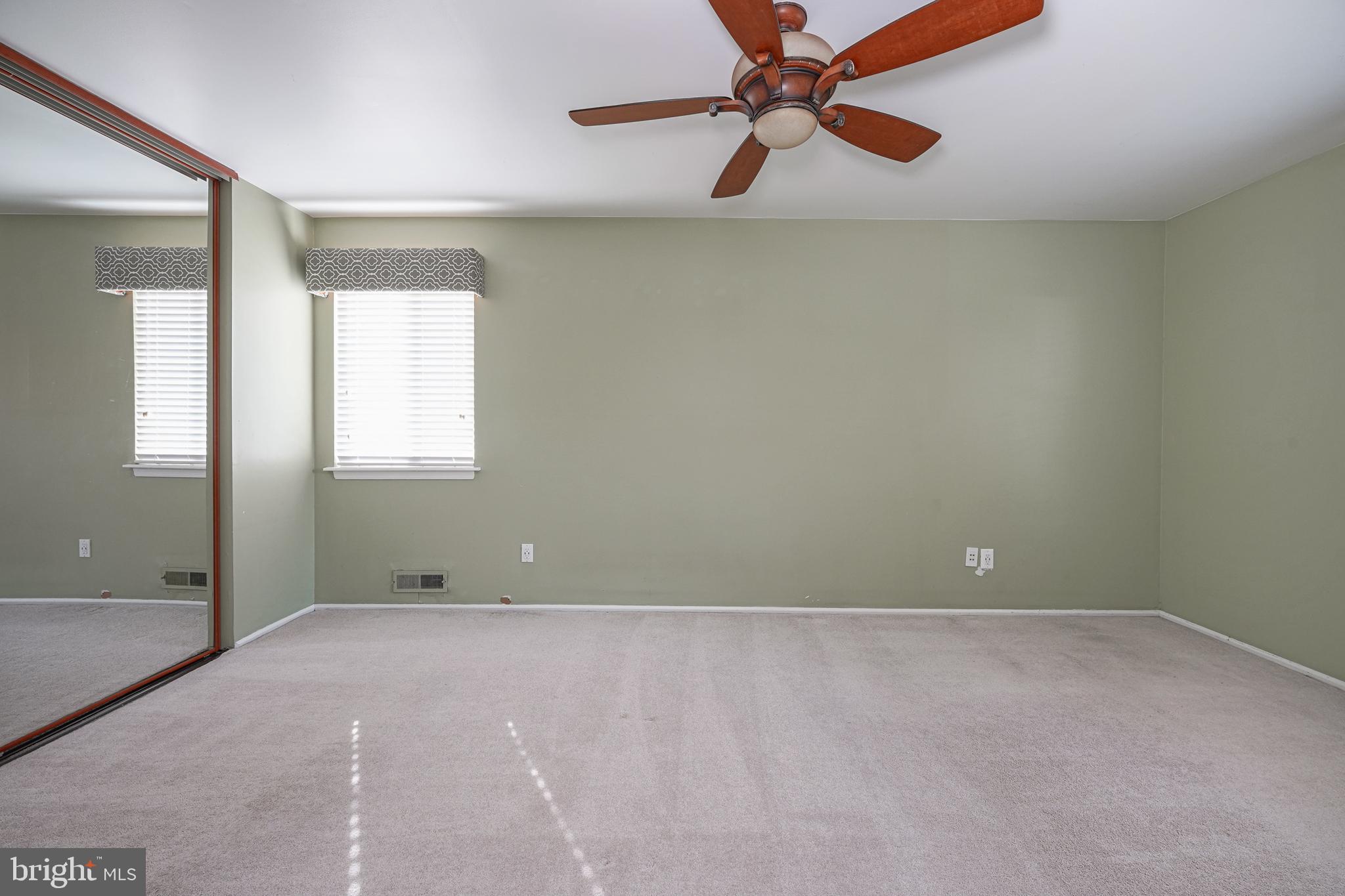 10 Gladstone Road Marlton, NJ 08053 - Photo 16 of 28 an empty room with windows and fan