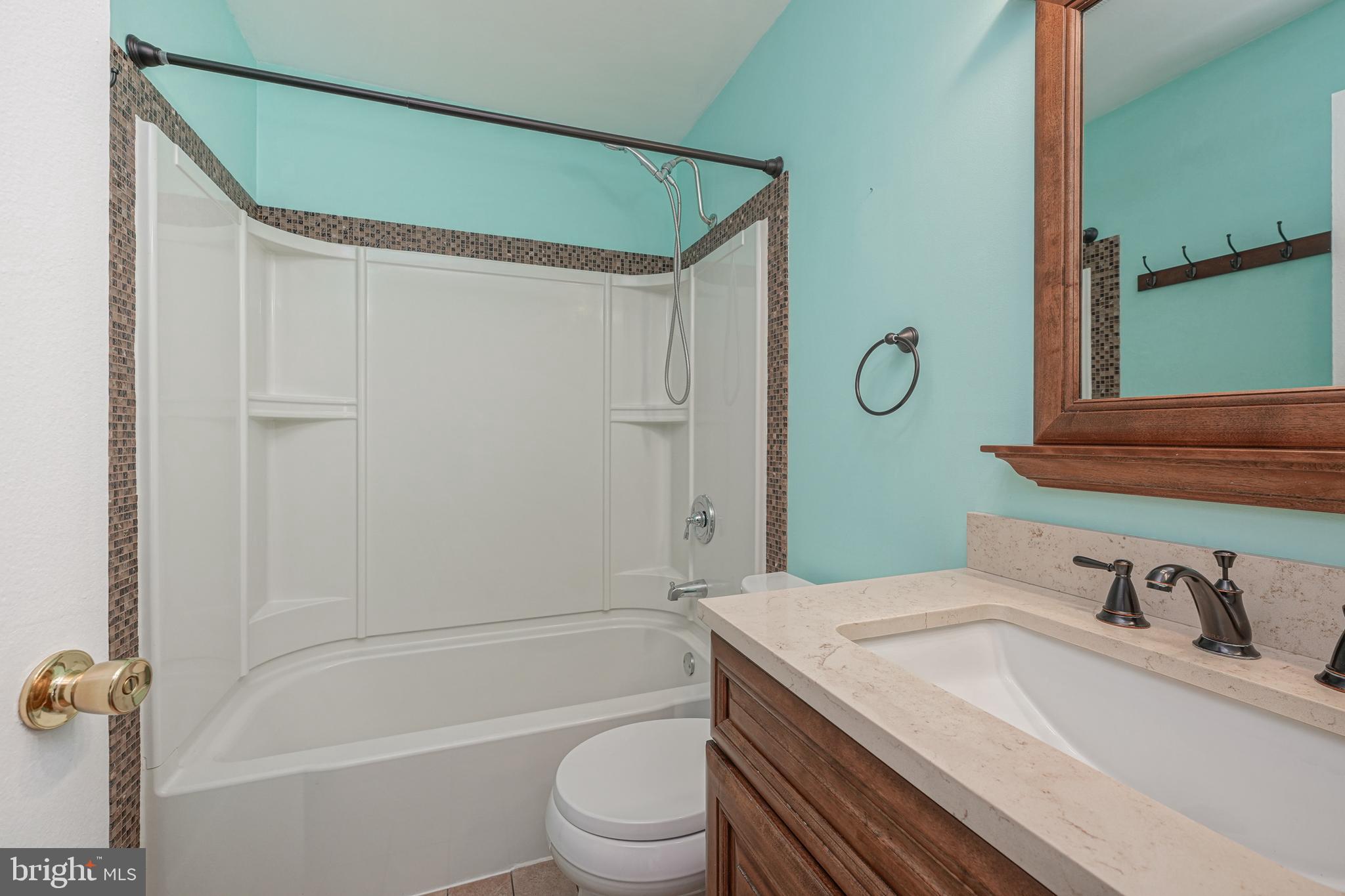 10 Gladstone Road Marlton, NJ 08053 - Photo 22 of 28 a bathroom with a granite countertop sink toilet and shower