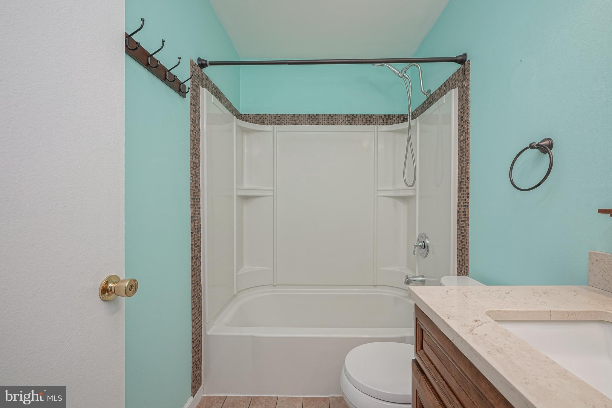 10 Gladstone Road Marlton, NJ 08053 - Photo 23 of 28 a bathroom with a granite countertop sink toilet and shower