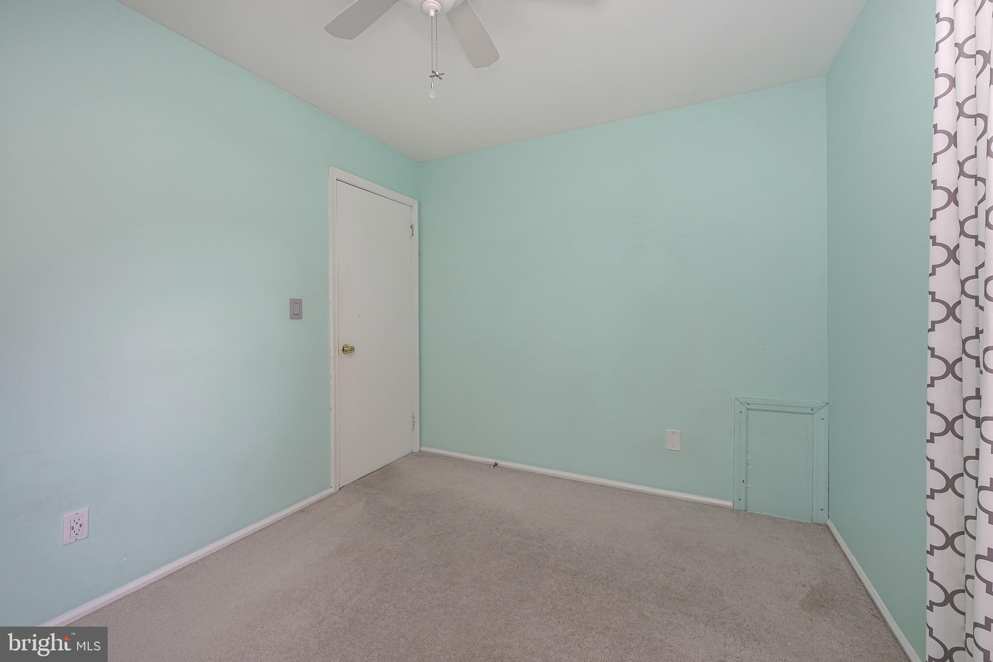 10 Gladstone Road Marlton, NJ 08053 - Photo 24 of 28 an empty room with a empty space and a window