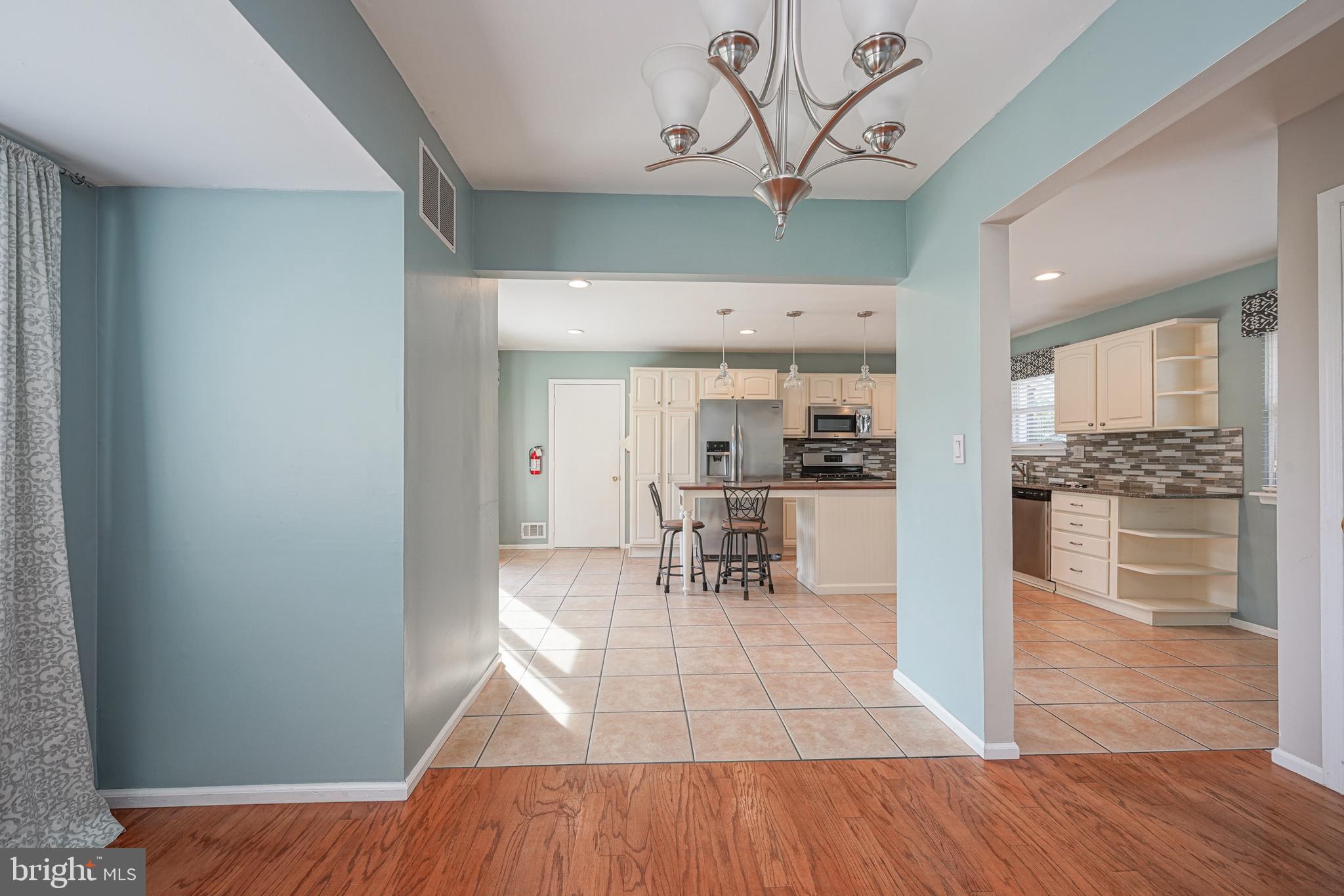 10 Gladstone Road Marlton, NJ 08053 - Photo 9 of 28 a view of kitchen with cabinets and wooden floor