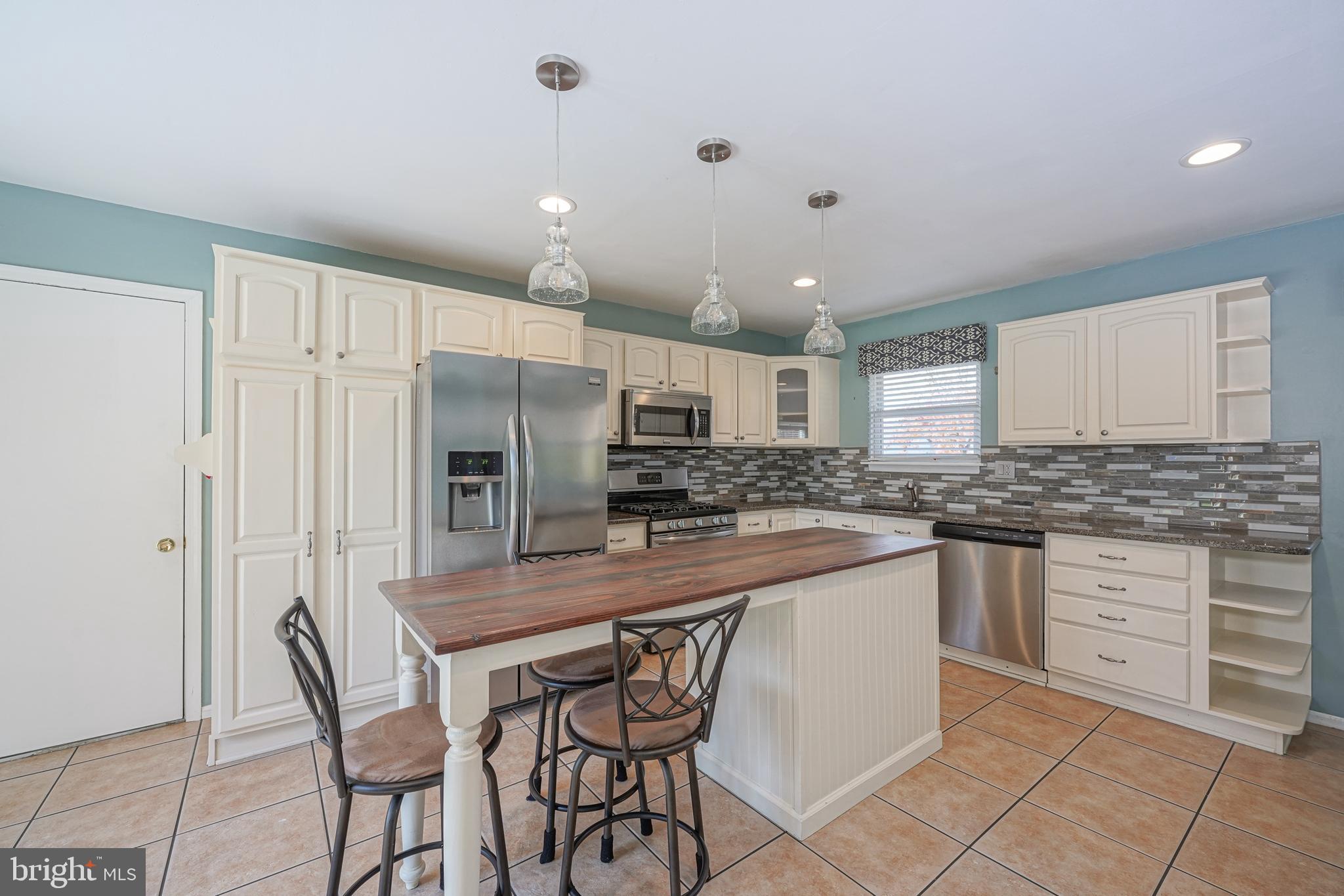 10 Gladstone Road Marlton, NJ 08053 - Photo 10 of 28 a kitchen with stainless steel appliances granite countertop a sink and cabinets