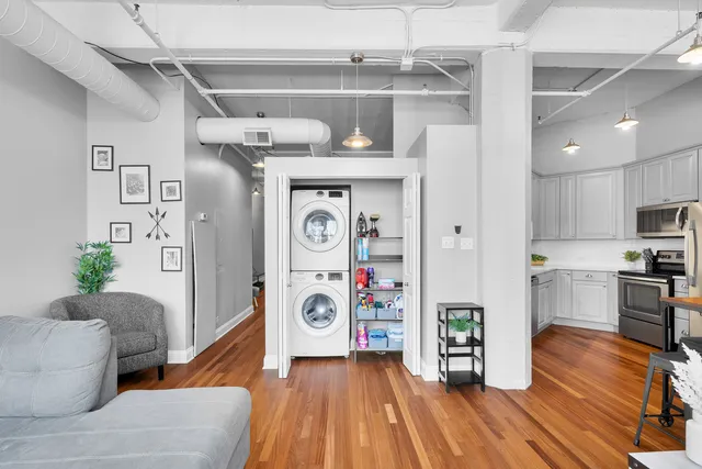 a view of livingroom with furniture and wooden floor