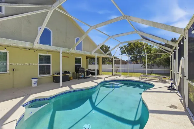 a view of a house with swimming pool