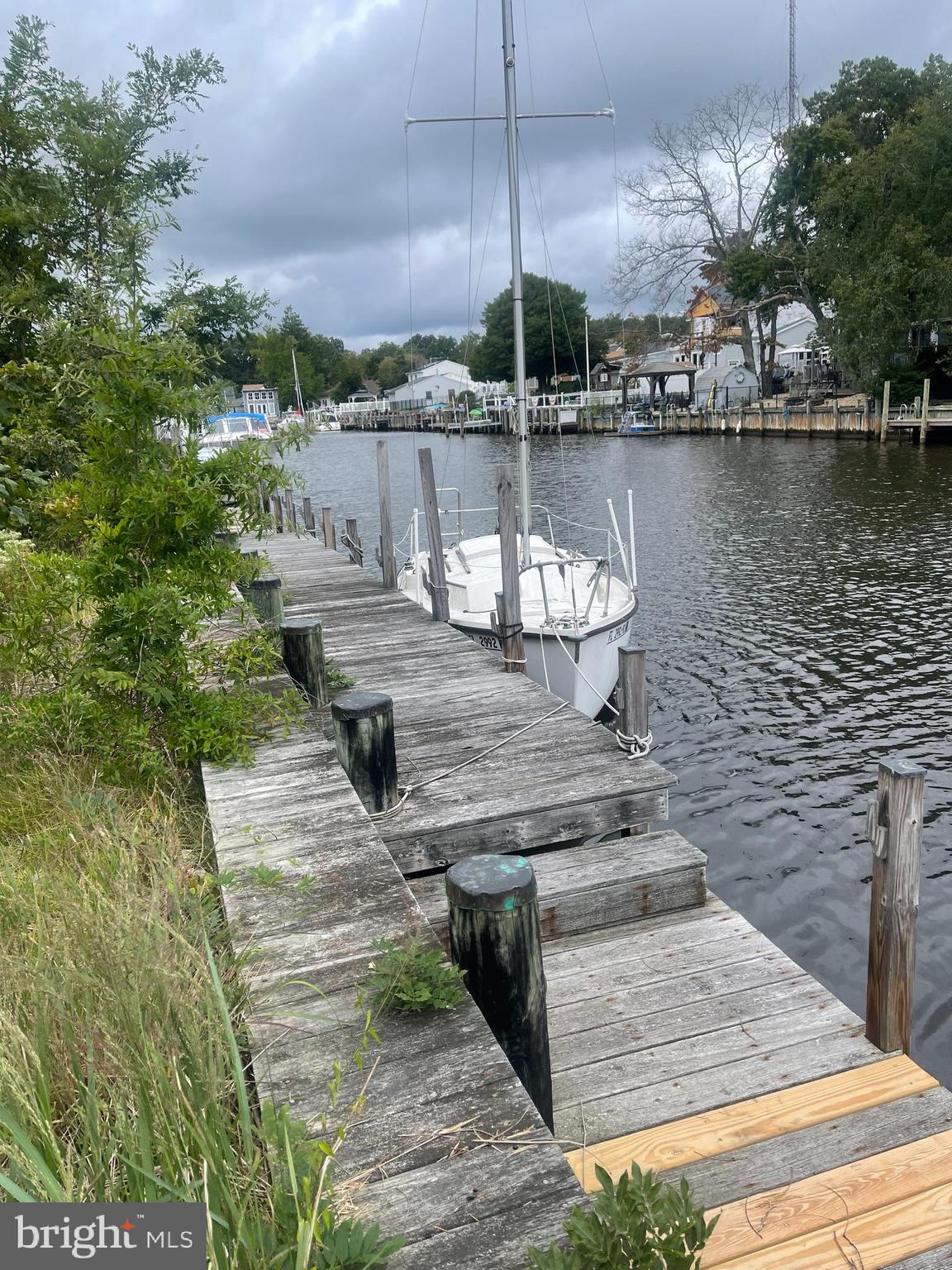 45 Cedar Run Road Bayville, NJ 08721 - Photo 3 of 10 a view of a lake with sitting area