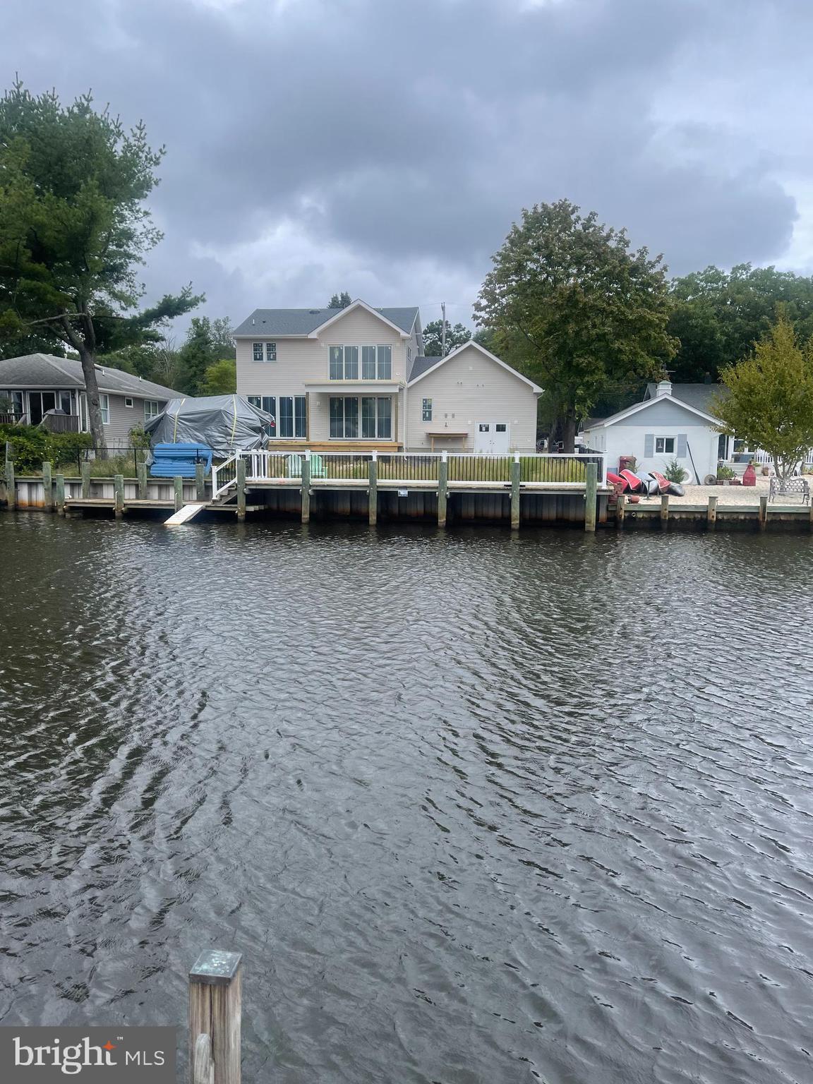 45 Cedar Run Road Bayville, NJ 08721 - Photo 5 of 10 a view of a lake with houses