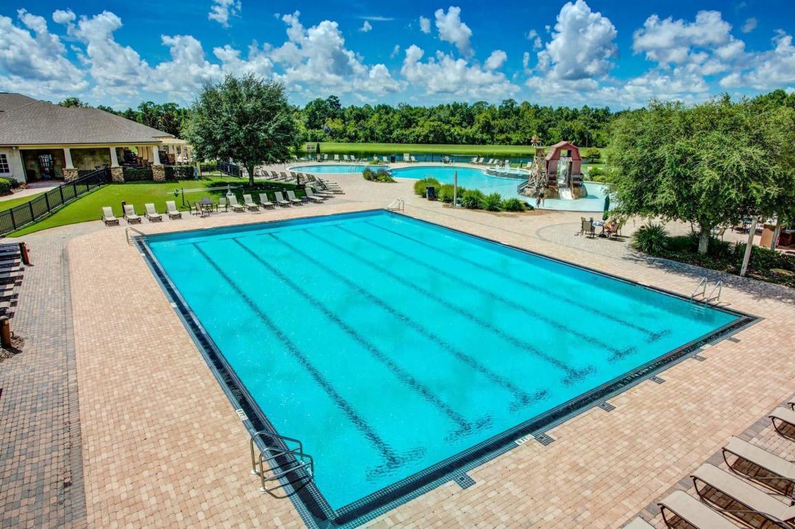 456 Windchime Way Freeport, FL 32439 - Photo 24 of 29 a view of a swimming pool with a patio