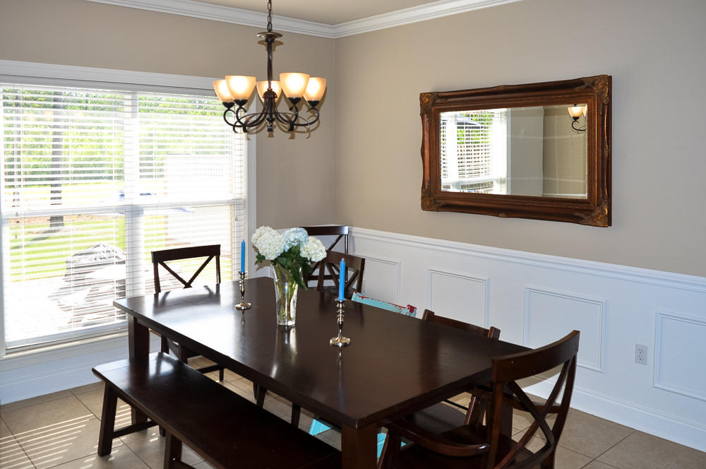 456 Windchime Way Freeport, FL 32439 - Photo 7 of 29 a dining room with furniture and window