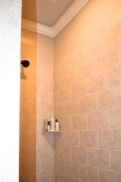 456 Windchime Way Freeport, FL 32439 - Photo 10 of 29 a bathroom with a shower