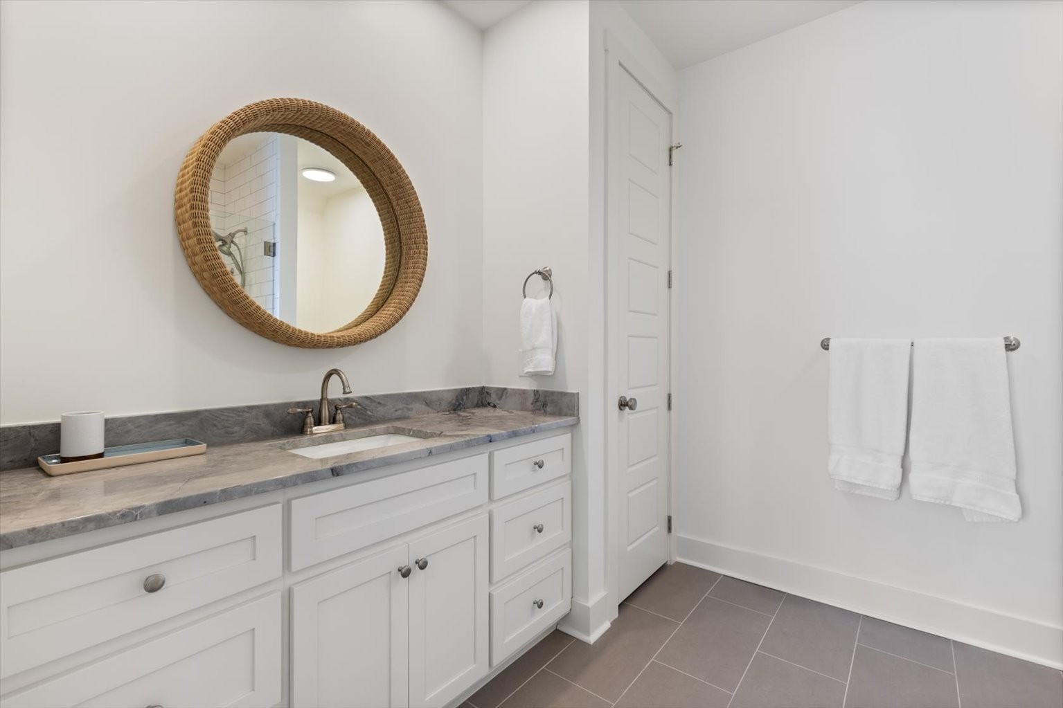 0 Martin Landing Road Bath Springs, TN 38311 - Photo 8 of 15 a bathroom with a granite countertop double vanity sink and a mirror