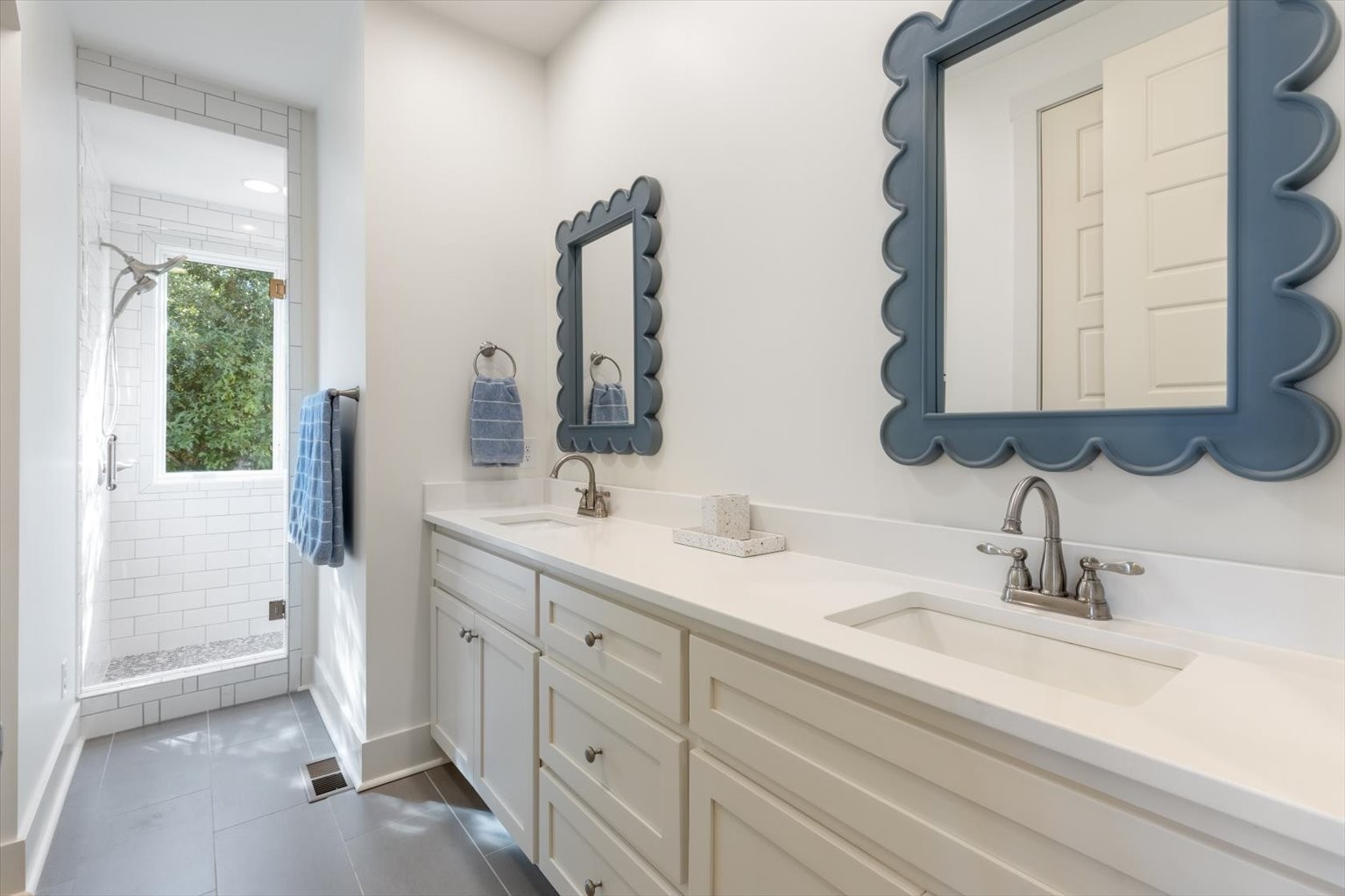 0 Martin Landing Road Bath Springs, TN 38311 - Photo 10 of 15 a bathroom with a double vanity sink and a mirror