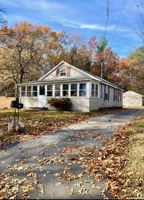 37 Harding Street North Chelmsford, MA 01863 - Photo 1 of 10 a front view of a house with a yard