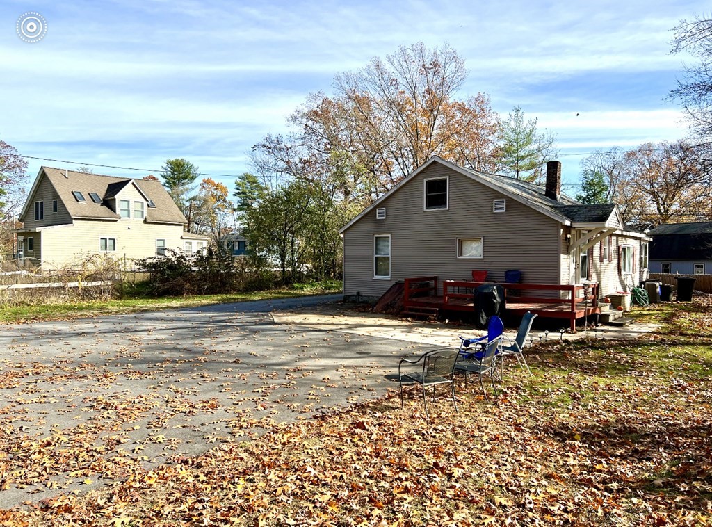 37 Harding Street North Chelmsford, MA 01863 - Photo 3 of 10 a view of a house with a yard