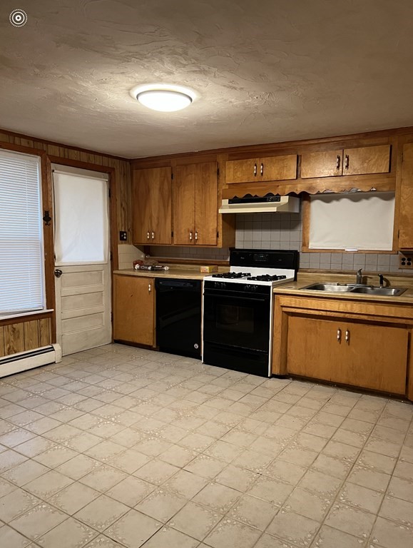37 Harding Street North Chelmsford, MA 01863 - Photo 6 of 10 a kitchen with stainless steel appliances granite countertop a stove a sink and a microwave