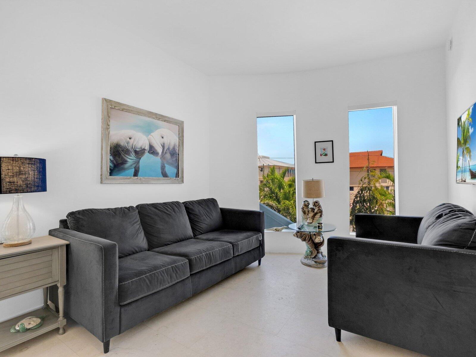 317 East Seaview Circle Marathon, FL 33050 - Photo 19 of 52 a living room with furniture and a couch